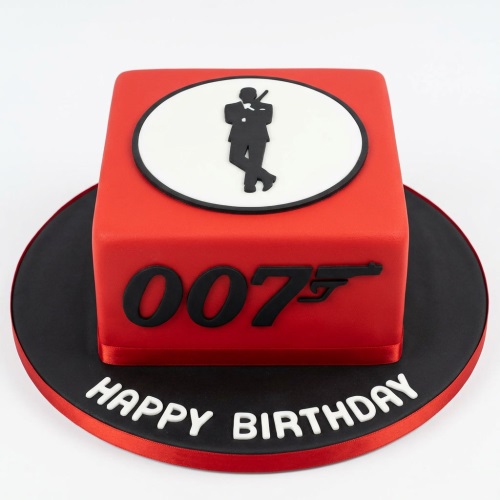 Red square 007 James Bond birthday cake with black logo and "Happy Birthday" text.