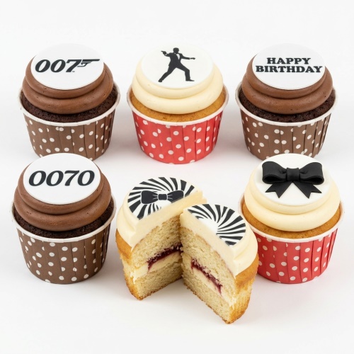 007 James Bond themed birthday cupcakes with spy silhouette, gun logo, bow tie, and Happy Birthday toppers.