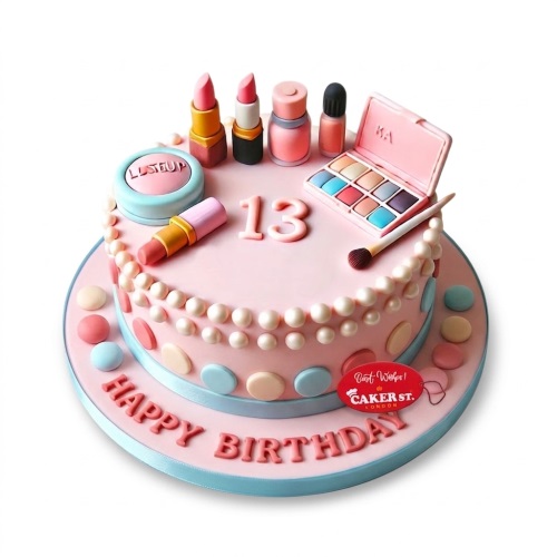 Pink two-tier birthday cake decorated with edible makeup items and custom age topper.