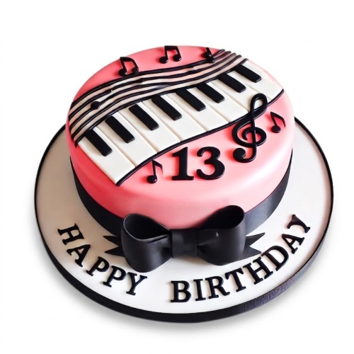 Round pink music theme birthday cake with piano keyboard, musical notes, treble clef, black bow, and custom age.