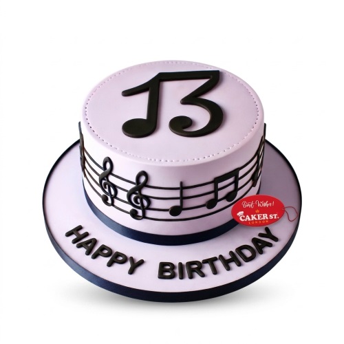 Round light purple birthday cake with black musical notes, staff, treble clef, and a custom age topper.