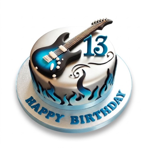 Round silver birthday cake with a blue and black electric guitar topper and blue flame decorations, with a custom age and 'Happy Birthday' message.