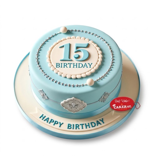 Light blue and cream birthday cake with a custom number topper and 'Happy Birthday' message.