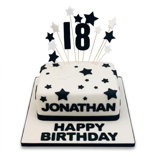 White square birthday cake with black and white stars, custom age topper, and personalised name.