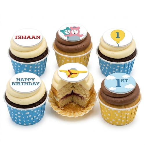 Assortment of 1st birthday cupcakes with aeroplane, balloon, and cartoon character toppers, with custom name and message examples.