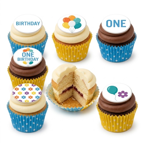 Set of 1st birthday cupcakes with balloon and flower toppers in yellow and blue wrappers.