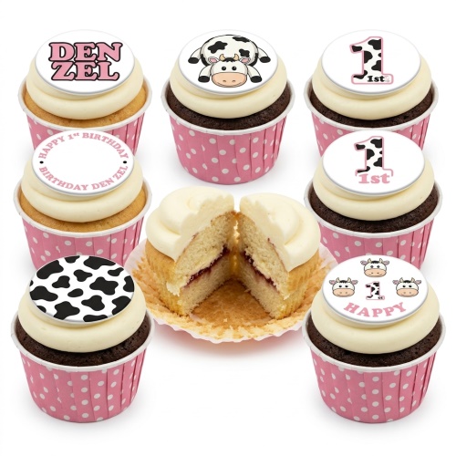 Baby cow 1st birthday cupcakes with personalised name and cow print toppers.
