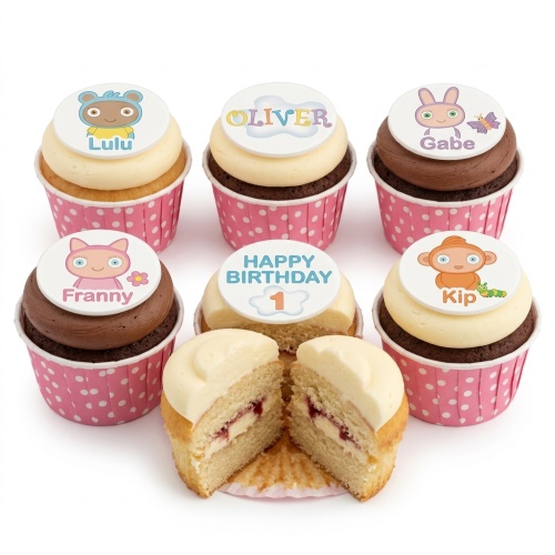 Kids birthday cupcakes with cartoon animal toppers and custom age/name options, in pink polka dot wrappers.