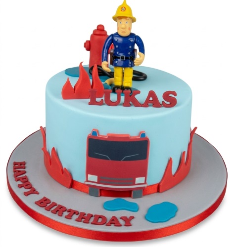 Single-tier light blue Fireman Sam birthday cake with a Fireman Sam figurine, fire engine, flames, and a personalised name.