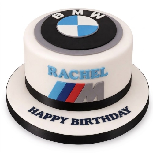 White round birthday cake with BMW logo, M-Sport stripes, and custom name.