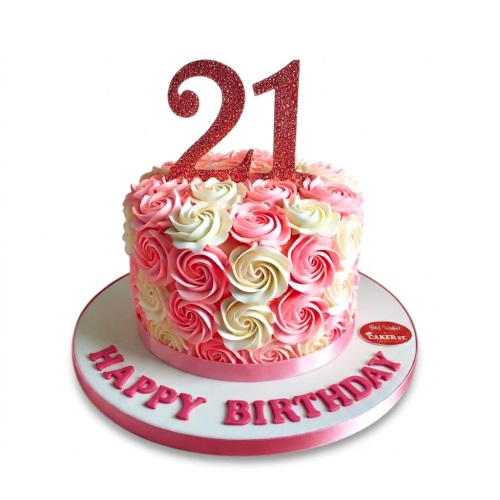 Round pink and cream floral rosette birthday cake with a red glitter custom age topper and 'Happy Birthday' message on the board.