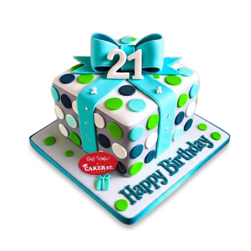 Square gift box birthday cake with teal bow, polka dots, and custom age topper.
