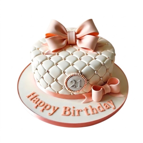 Elegant round birthday cake with white quilted icing, peach bows, edible pearls, and a custom age plaque.