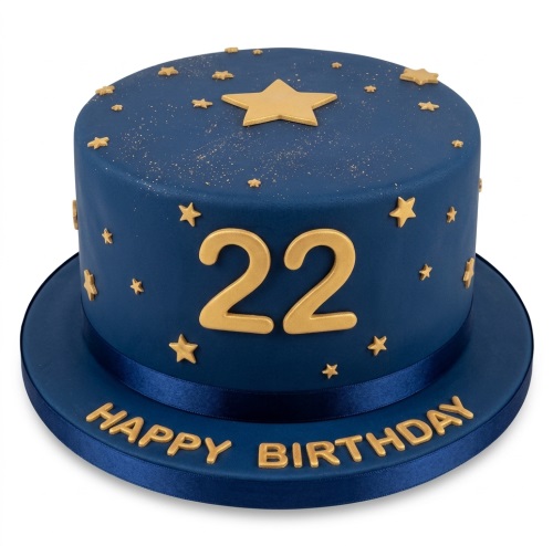Blue fondant birthday cake with gold stars, edible glitter, and gold custom age numbers on the side, with a 'Happy Birthday' message on the board.