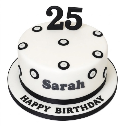 White and black elegant birthday cake with custom age topper and personalised name.