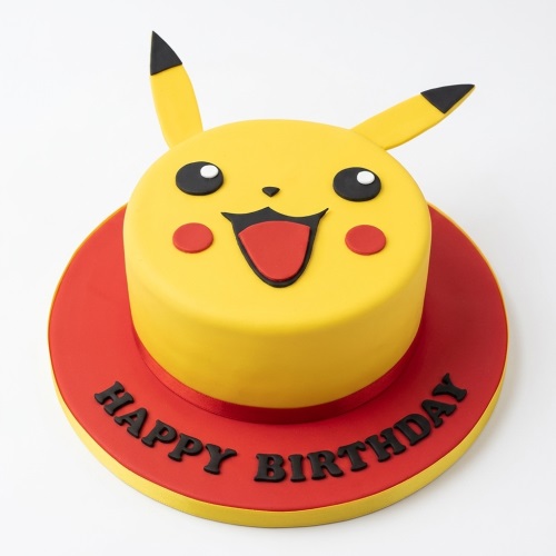 Single-tier round yellow Pikachu character birthday cake with red base and 'Happy Birthday' message.