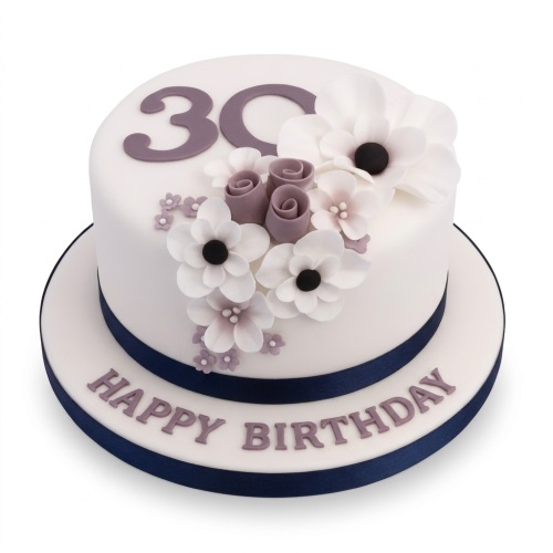 White single-tier floral birthday cake with purple sugar flowers and custom age topper.