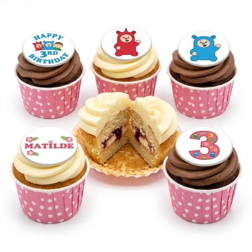 In the Night Garden themed cupcakes with Igglepiggle, Upsy Daisy, and Makka Pakka toppers, some with custom age and name.