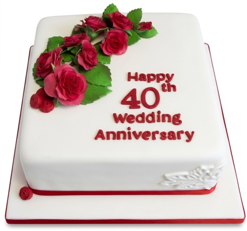 White square cake with red roses and 'Happy 40th Wedding Anniversary' message.