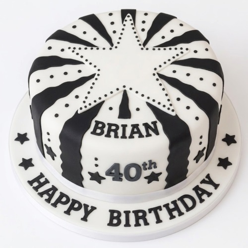 Round black and white starburst design birthday cake with custom age and personalised name.