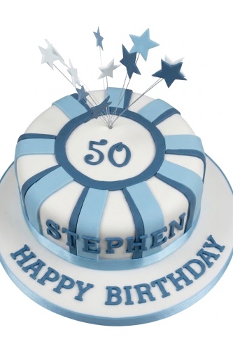 Round white and blue birthday cake with starburst toppers and custom age number.