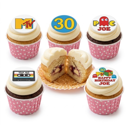Cupcakes with retro 80s 90s toppers: MTV, Pac-Man, cassette tape, Rubik's Cube, and custom age.