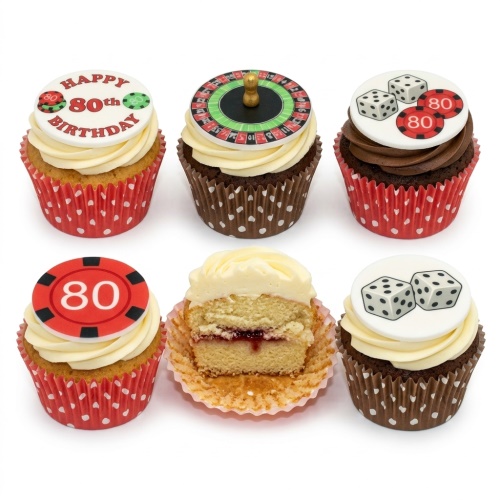 Cupcakes with casino theme toppers including a roulette wheel, dice, and poker chips, with a custom age birthday message.