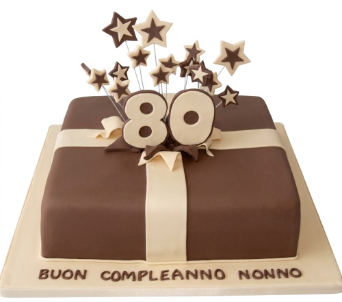 Square brown gift box birthday cake with cream ribbon, custom age topper, and star decorations.