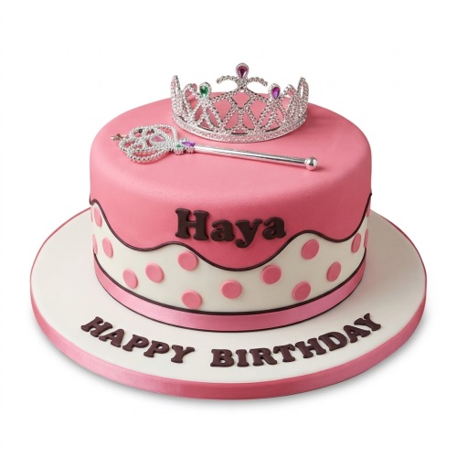 Pink princess birthday cake for girls with a silver crown, wand, and pink polka dots, with a personalised name and message.