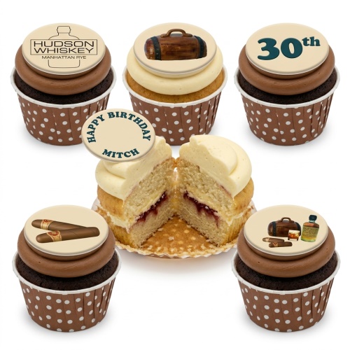Assorted birthday cupcakes with whiskey bottles, cigars, and barrel toppers.