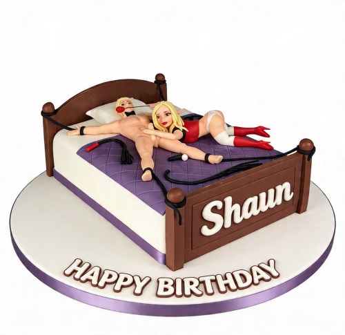 A humorous adult-themed birthday cake shaped like a bed with edible figures and a personalised message.