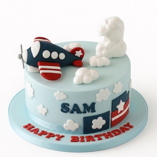 Light blue birthday cake with a 3D red and blue airplane, white clouds, and 'Happy Birthday' message.