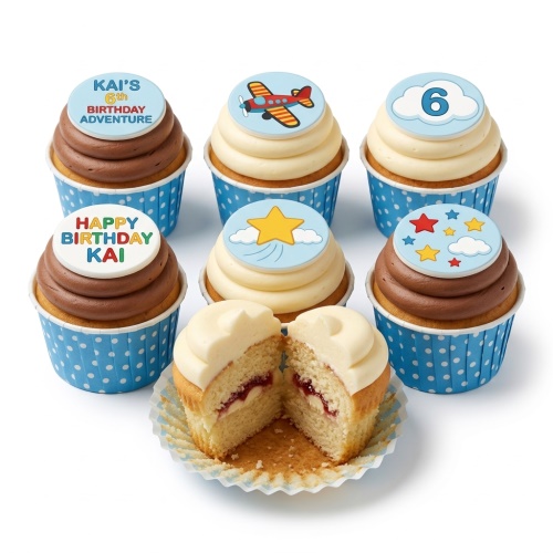Assortment of aeroplane and sky themed cupcakes with custom age topper and stars.