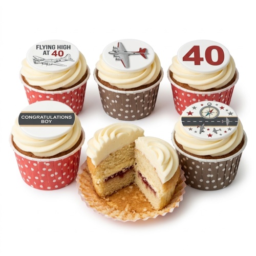 Aviation theme cupcakes with aeroplanes, compass, and custom age/message toppers on white frosting.