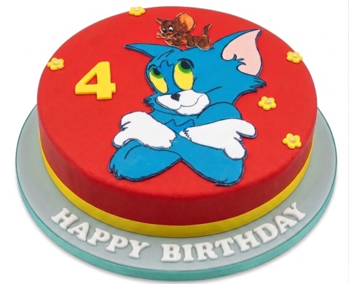 Round red Tom and Jerry birthday cake with a large blue Tom, small brown Jerry, yellow number, and "Happy Birthday" message.