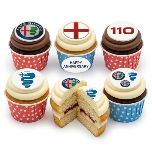 A selection of Alfa Romeo themed anniversary cupcakes with England flag and 'Happy Anniversary' toppers, some chocolate, some vanilla.