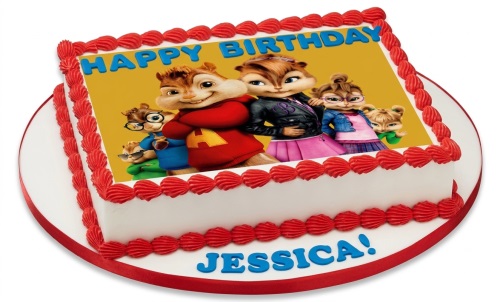 Square white birthday cake with red piping and an edible image of Alvin and the Chipmunks, with 'Happy Birthday' and a custom name.