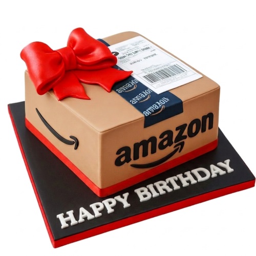 Amazon parcel birthday cake with red bow and 'Happy Birthday' message on black board.