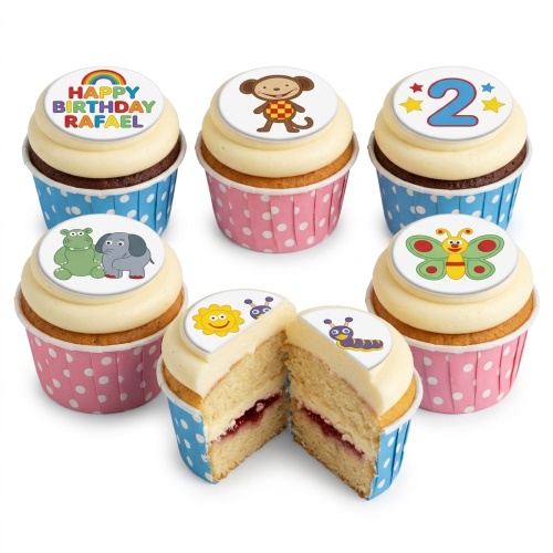 Assortment of kids birthday cupcakes with animal, rainbow, and custom age toppers.