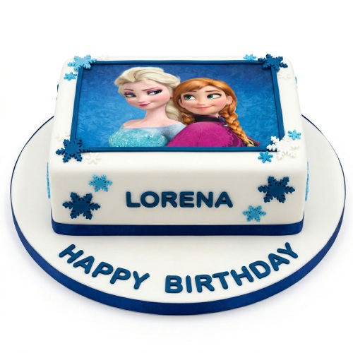 Square white fondant cake with Elsa and Anna image, blue snowflakes, and custom name.