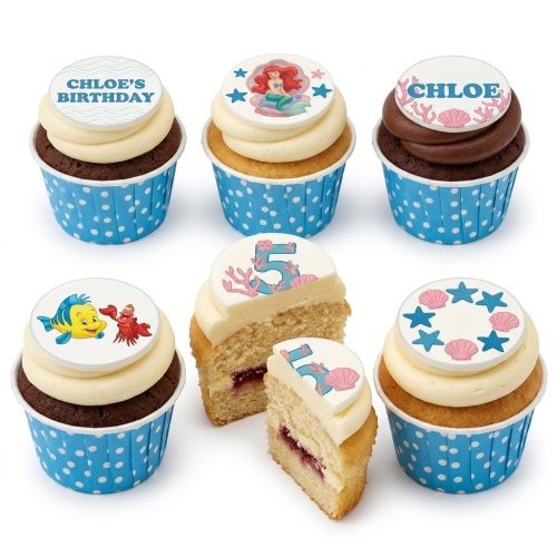 Mermaid themed birthday cupcakes with Ariel, Flounder, Sebastian, and customisable sea-themed toppers.