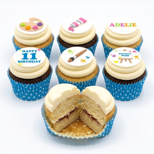 Art theme birthday cupcakes with paint palette, brush, tube, and easel decorations, featuring custom age and name examples.