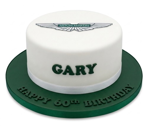 White round cake with Aston Martin logo, green base, and custom message