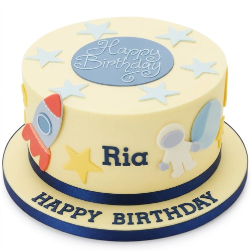 Round cream birthday cake with rocket, astronaut, light blue and yellow stars, and 'Happy Birthday' message.