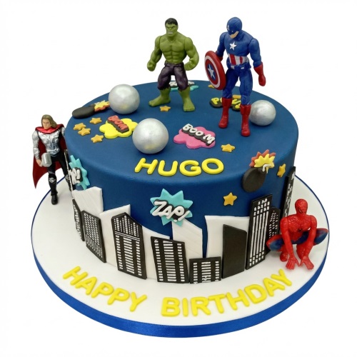 Superhero themed birthday cake with Hulk, Captain America, Thor, and Spiderman figures on a blue cityscape design, with a custom name and 'Happy Birthday' message.