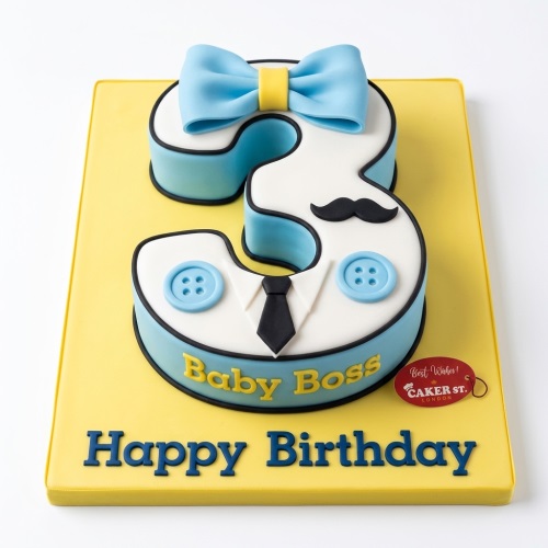 Number 3 Baby Boss birthday cake with blue bow tie and moustache