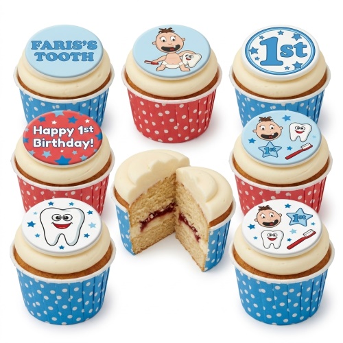 Baby's 1st birthday cupcakes with baby, tooth, and '1st' themed edible toppers in red and blue wrappers.