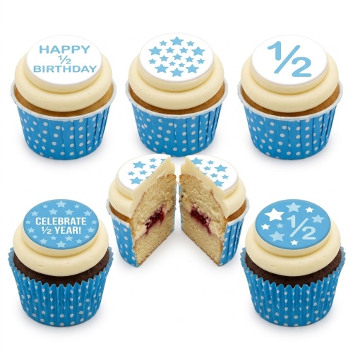 Blue and white cupcakes with star and '1/2 Birthday' toppers in blue polka dot cases.