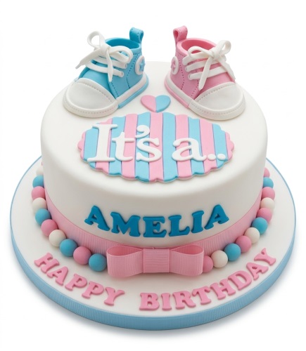 White baby shower cake with pink and blue baby shoes, ribbon, and edible pearls.