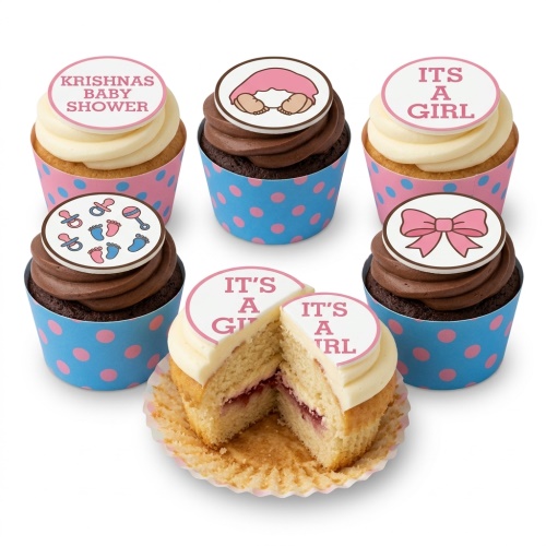 Cupcakes with "It's a Girl" and baby-themed toppers in pink and blue wrappers.